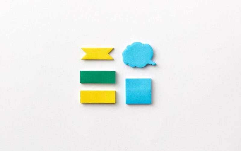 An Assorted Sticky Note Pads on a White Surface