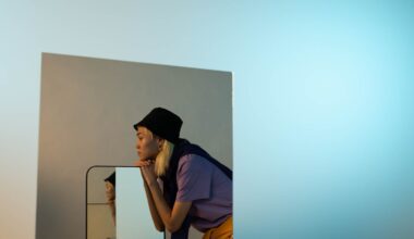 A Person in Black Bucket Hat and Purple Shirt