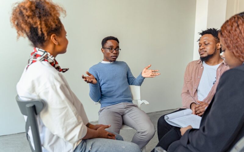 People in a Group Psychotherapy Session
