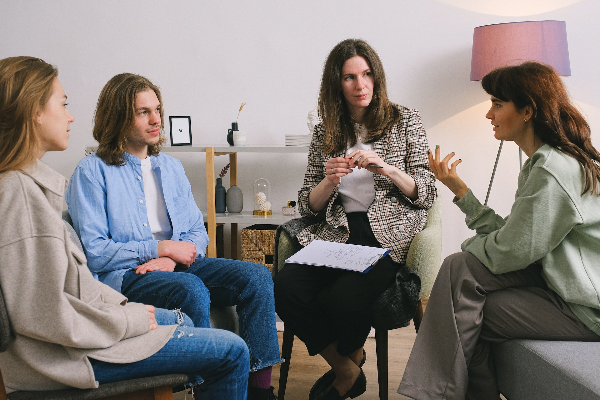 A group of people attending a support group session