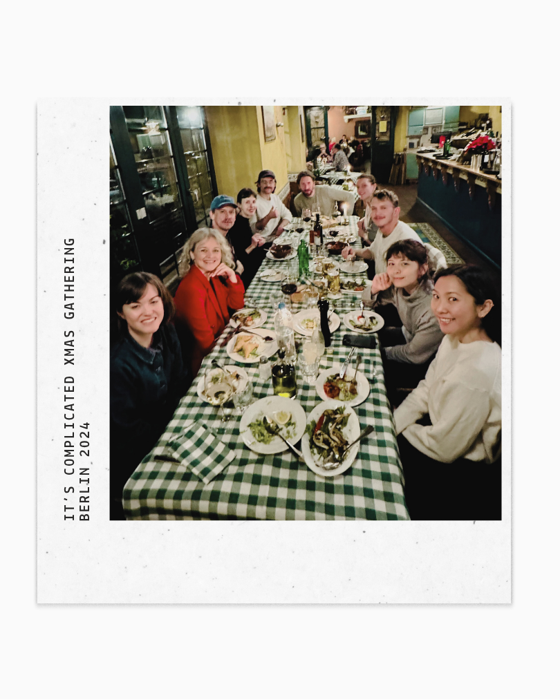 A team photo at dinner during the It's Complicated Christmas get together.