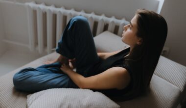 Woman Sitting alone on a Sofa