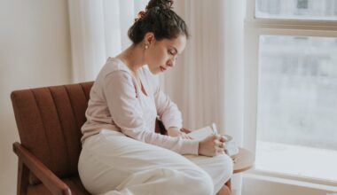 Woman Journaling by the Window in Natural Light