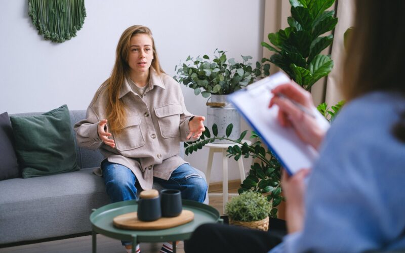 A woman in a talking therapy session