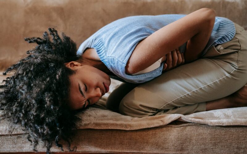 Woman Suffering from a Stomach Pain